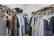 Walk-in closet with ample shelving, hanging rods, and organized clothing storage at 529 N Graham St # 3F, Charlotte, NC 28202