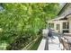 This spacious back deck overlooks a creek, providing a serene outdoor living space at 5617 Sugarcane Ct, Mint Hill, NC 28227