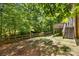 This expansive yard features a fence line and access to a back deck area for outdoor living at 5617 Sugarcane Ct, Mint Hill, NC 28227