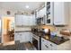 Updated kitchen featuring granite countertops, stainless steel appliances, and ample cabinet space at 5617 Sugarcane Ct, Mint Hill, NC 28227