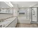 Bathroom featuring double vanity, granite counters, soaking tub, and a tiled shower at 5818 Downfield Wood Dr, Charlotte, NC 28269