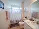 Neutral bathroom with a walk in shower, modern sink and fixtures, and plenty of natural light at 6266 Swanport Rd, Lancaster, SC 29720