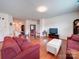 Open living space with hardwood floors and generous seating areas at 6266 Swanport Rd, Lancaster, SC 29720