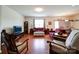 Inviting living room with wood floors, comfortable seating, and natural light at 6266 Swanport Rd, Lancaster, SC 29720