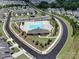 A scenic aerial view of a community pool, ideal for relaxation and fun in a Gathering-friendly neighborhood at 6266 Swanport Rd, Lancaster, SC 29720
