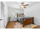 Comfortable bedroom featuring hardwood floors and neutral decor at 6301 Cherrycrest Ln, Charlotte, NC 28217