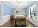 Elegant dining room with hardwood floors, stylish lighting, and dining table with upholstered chairs at 6301 Cherrycrest Ln, Charlotte, NC 28217