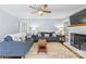 Spacious living room featuring a cozy fireplace at 6301 Cherrycrest Ln, Charlotte, NC 28217