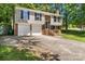 Charming split-level home boasts a two-car garage and traditional design at 6839 Wagon Oak Rd, Charlotte, NC 28212