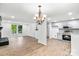 An open-concept living space that combines the kitchen and living room, perfect for entertaining at 6839 Wagon Oak Rd, Charlotte, NC 28212