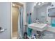 Updated bathroom with a modern sink, vanity, marine-themed decor and a shower at 701 5Th Ne Ave, Conover, NC 28613