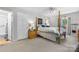 Inviting bedroom featuring a four-poster bed, neutral carpet, and a ceiling fan at 701 5Th Ne Ave, Conover, NC 28613