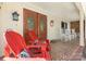 Inviting front porch with classic rocking chairs and beautiful tile flooring at 701 5Th Ne Ave, Conover, NC 28613