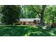 Beautiful home with a landscaped front yard and colorful flowerbeds at 701 5Th Ne Ave, Conover, NC 28613