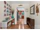 Hallway with wood floors leading into the kitchen at 701 5Th Ne Ave, Conover, NC 28613
