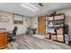 Finished basement featuring a desk with chair, overhead lighting, and storage shelves at 701 5Th Ne Ave, Conover, NC 28613