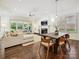 Bright living room with fireplace and outside view at 7011 Conservatory Ln, Charlotte, NC 28210