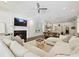 Bright living room with fireplace and open concept to the kitchen at 7011 Conservatory Ln, Charlotte, NC 28210