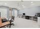Bright office with multiple work stations, neutral paint, and natural light at 7011 Conservatory Ln, Charlotte, NC 28210
