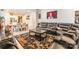 Living room and dining area with a sectional sofa, decorative rug, and TV at 8008 Brookbank Dr, Charlotte, NC 28269