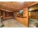 Spacious basement with concrete flooring and custom built in shelves at 908 Taylor St, Kannapolis, NC 28083