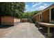 Long gravel driveway with parking space and backyard access at 908 Taylor St, Kannapolis, NC 28083