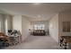 Open bonus room with versatile space for a home office or entertainment area at 9586 Kartey Nw Ave, Concord, NC 28027