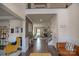 Inviting foyer featuring hardwood floors, neutral walls, and views of the living space at 9586 Kartey Nw Ave, Concord, NC 28027
