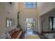 Bright entryway showcasing hardwood floors, modern decor, and a welcoming ambiance at 9586 Kartey Nw Ave, Concord, NC 28027