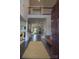 Inviting foyer with hardwood floors, a view of the living room, and staircase at 9586 Kartey Nw Ave, Concord, NC 28027