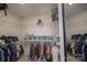 Spacious walk-in closet with ample shelving and rods for clothing storage at 9586 Kartey Nw Ave, Concord, NC 28027