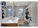 Bright bathroom featuring a large vanity, tile floors, and a shower with a fun cat shower curtain at 1021 Stinson Glen Ln, Charlotte, NC 28214