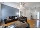 Cozy living room features hardwood floors, comfortable seating, and plenty of natural light at 1021 Stinson Glen Ln, Charlotte, NC 28214