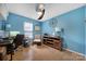 Cozy office features wood floors, natural light, ceiling fan and ample work space at 1021 Stinson Glen Ln, Charlotte, NC 28214