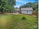 Spacious backyard and patio perfect for outdoor gatherings at 10701 Copper Field Dr, Pineville, NC 28134