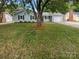 Charming home with light blue siding, black shutters, and a single-car garage at 10701 Copper Field Dr, Pineville, NC 28134