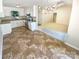 Bright kitchen with white cabinets and stainless steel appliances at 10701 Copper Field Dr, Pineville, NC 28134