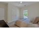 Inviting bedroom features a soft bed, closet and window with natural light for a cozy feel at 11224 Warfield Ave, Huntersville, NC 28078