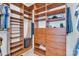 Custom walk-in closet with built-in shelving and drawers providing ample storage space at 11224 Warfield Ave, Huntersville, NC 28078