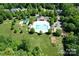 Aerial shot of the community pool, playground, picnic shelter and green space at 11224 Warfield Ave, Huntersville, NC 28078