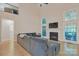 Bright and airy living room with a fireplace, vaulted ceilings, and large windows at 11224 Warfield Ave, Huntersville, NC 28078