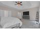 Spacious main bedroom features modern ceiling fan, neutral walls, carpet floors and plenty of room for dressers at 11224 Warfield Ave, Huntersville, NC 28078