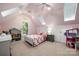 Bright bedroom with a comfortable bed, carpet floor, closet and many windows at 11510 Pine Valley Club Dr, Charlotte, NC 28277