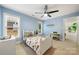 Comfortable bedroom with white bed, carpet flooring, ceiling fan and window with natural light at 11510 Pine Valley Club Dr, Charlotte, NC 28277