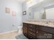 Bathroom with a double sink vanity, granite countertops, and a separate shower at 1221 Brookcrest Ln, Fort Mill, SC 29708
