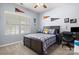 bedroom featuring natural light, decor, carpet floors, ceiling fan, and wooden furniture at 1221 Brookcrest Ln, Fort Mill, SC 29708