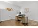 Office space featuring hardwood floors, a desk, natural light, and modern decor at 1221 Brookcrest Ln, Fort Mill, SC 29708