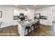 Open concept kitchen with island, stainless steel appliances, and a breakfast bar at 1390 6Th Ne St, Hickory, NC 28601