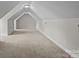 Large bonus room with neutral walls and carpet and dormered ceilings at 1607 Essex Hall Dr, Rock Hill, SC 29730