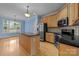 Charming eat-in kitchen with an island, modern appliances, and a stainless steel refrigerator at 1607 Essex Hall Dr, Rock Hill, SC 29730